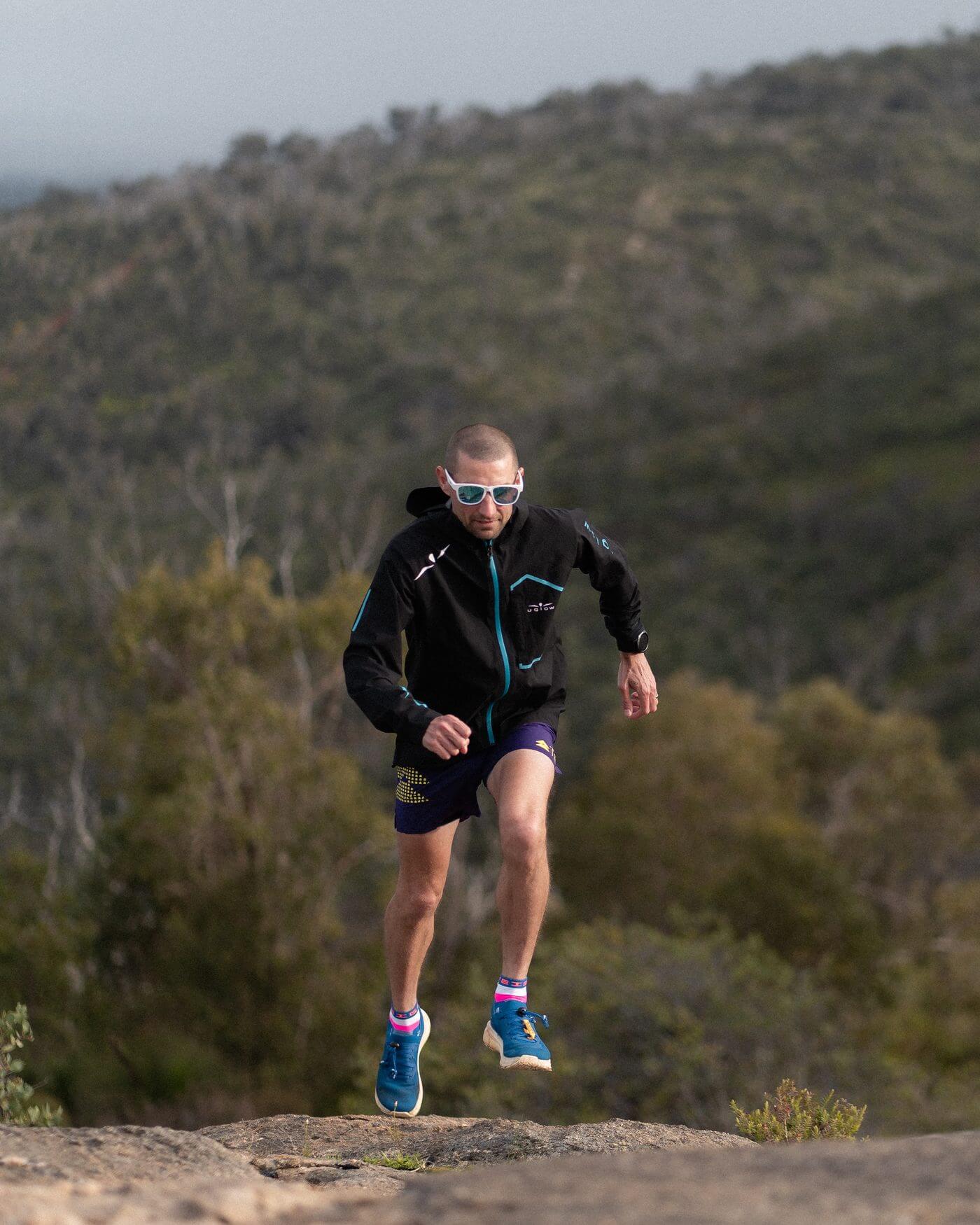 Phil Gore trail running through the Wungong bushland, Western Australia
