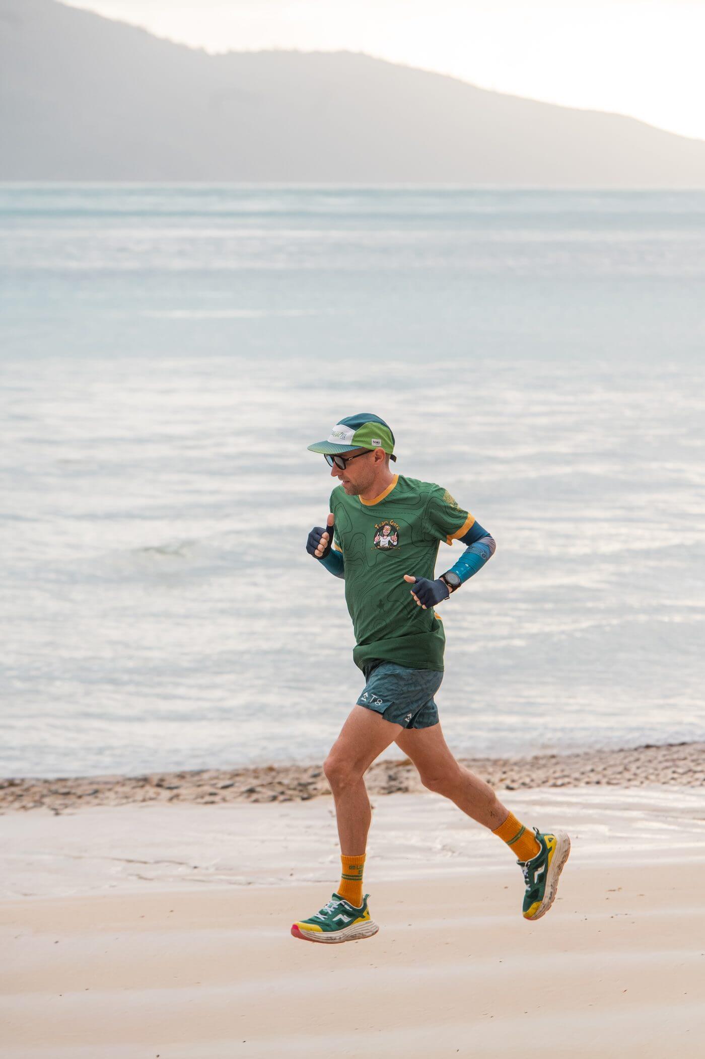 Phil Gore running on a Western Australian beach